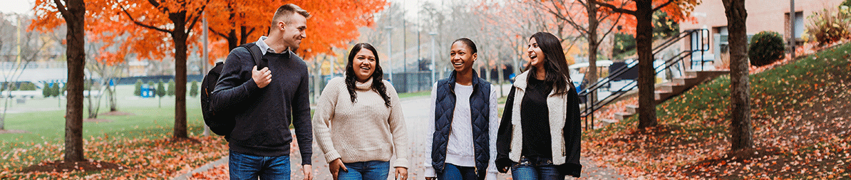 Students Walking Through Campus